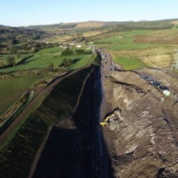 Rock breaking to northern batter at Slievereagh -briseadh carraige ag an Sliabh Riabhach